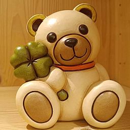 Salvadanaio Teddy con quadrifoglio